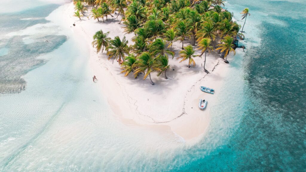 A breathtaking, first-person aerial photo of the 365 islands, shot from a plane or helicopter window