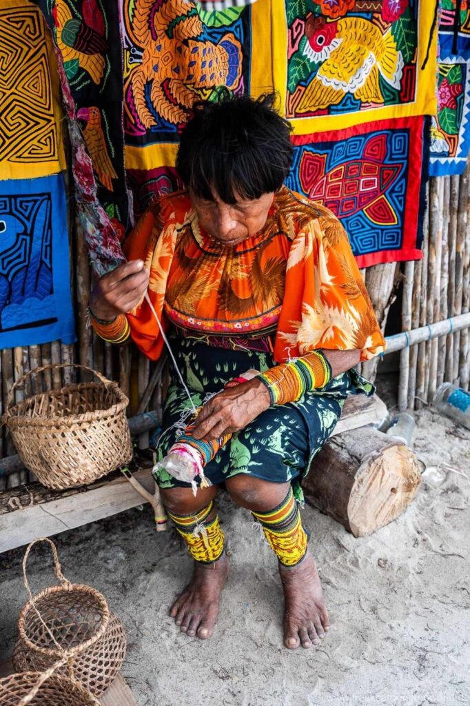 A stunning, respectful photo of a Guna village or a mola being made