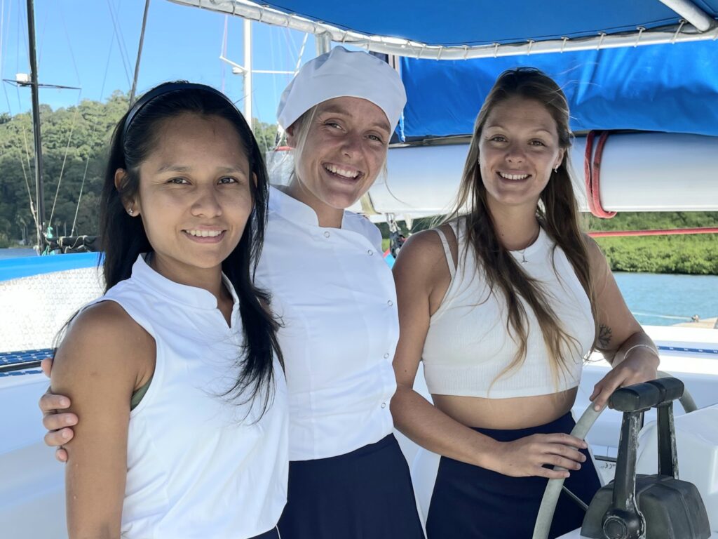 A beautiful, professional photo of the Nomade at anchor, looking safe, modern, and reliable